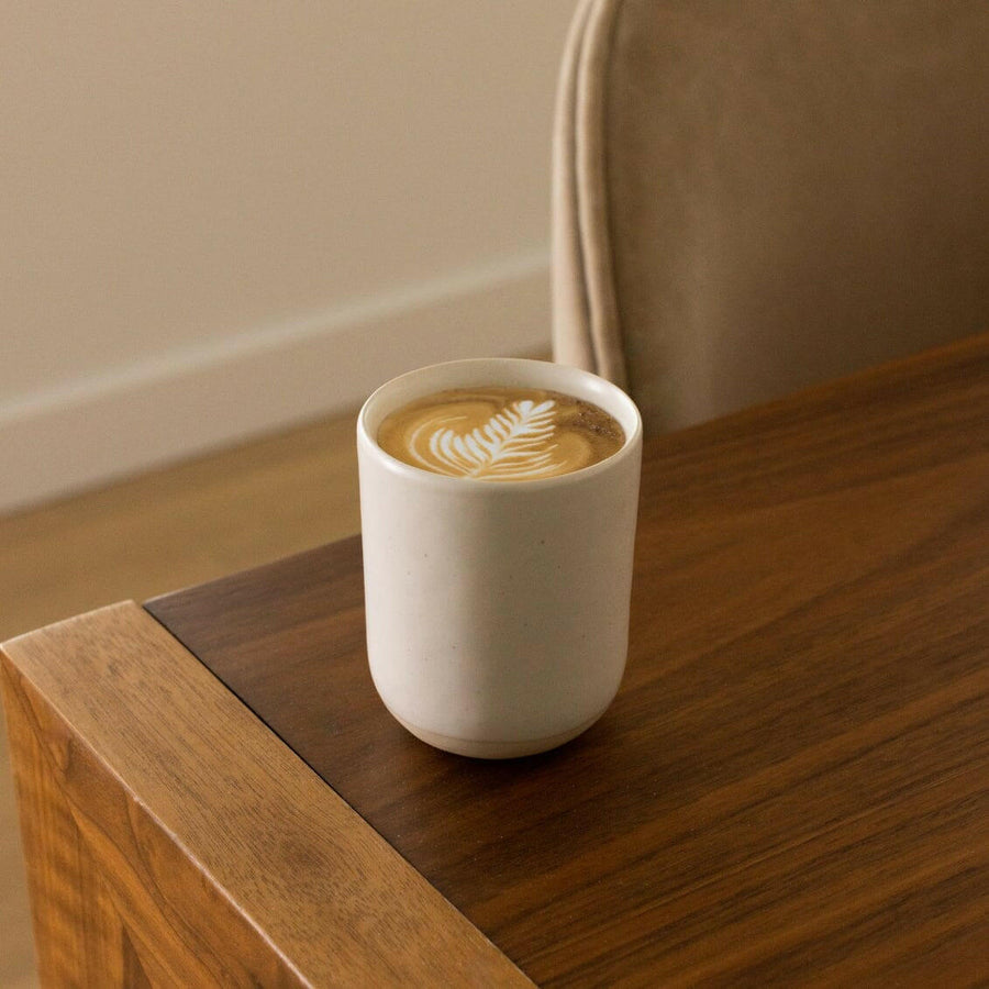 Premium cappuccino served in an elegant cup, showcasing rich aroma and smooth texture for coffee enthusiasts.