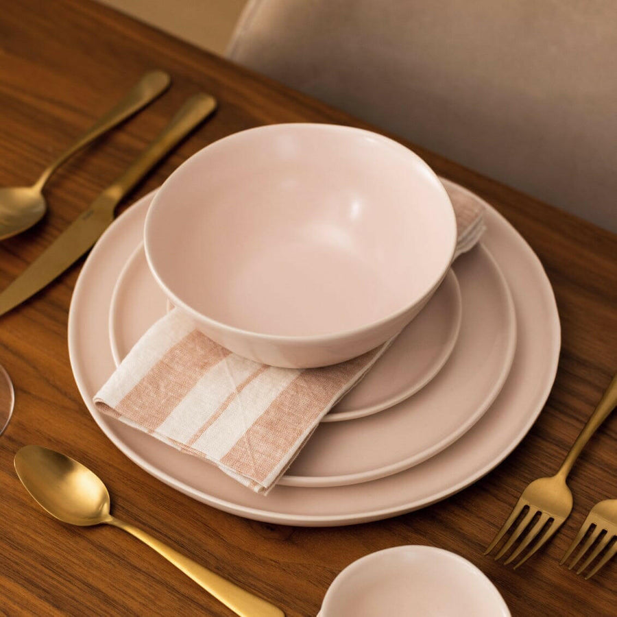 Elegant dinnerware set featuring classic design for formal dining occasions and sophisticated table settings.