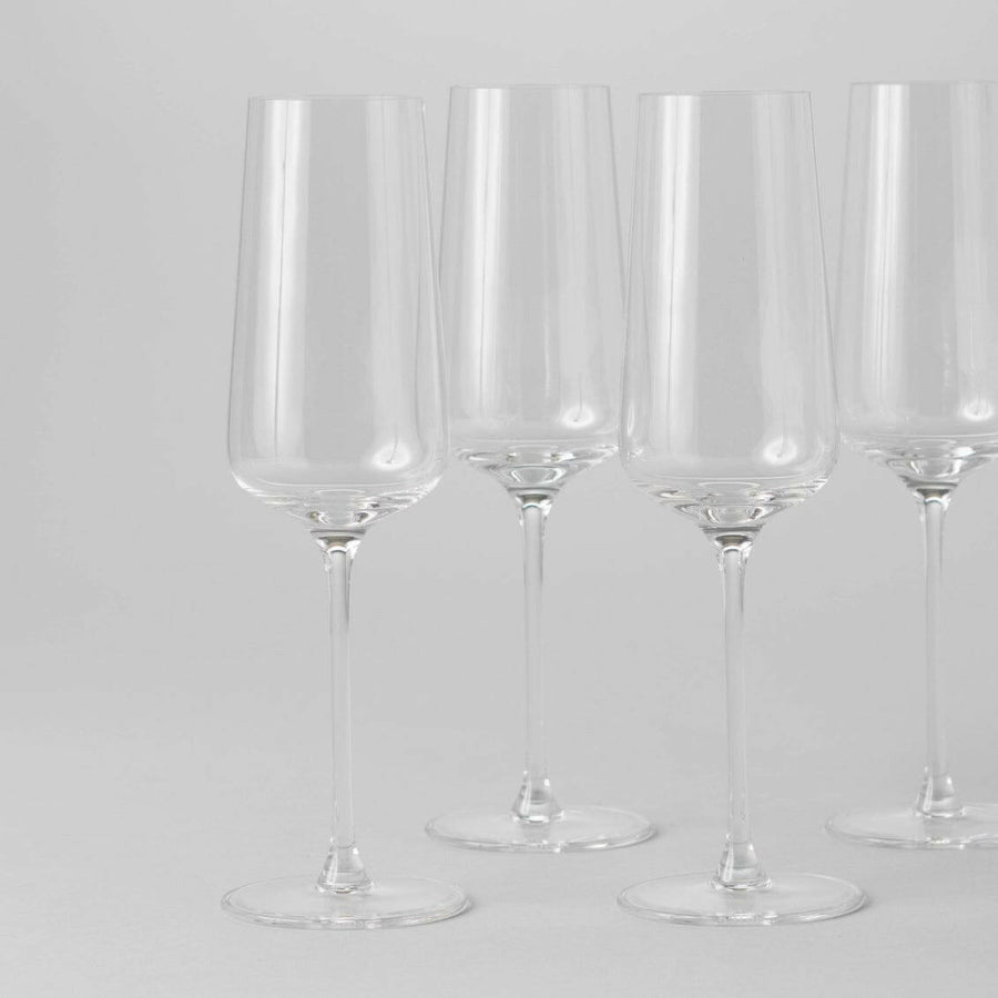 Elegant flute glasses showcasing refined design, perfect for upscale gatherings and enhancing wine tasting experiences.