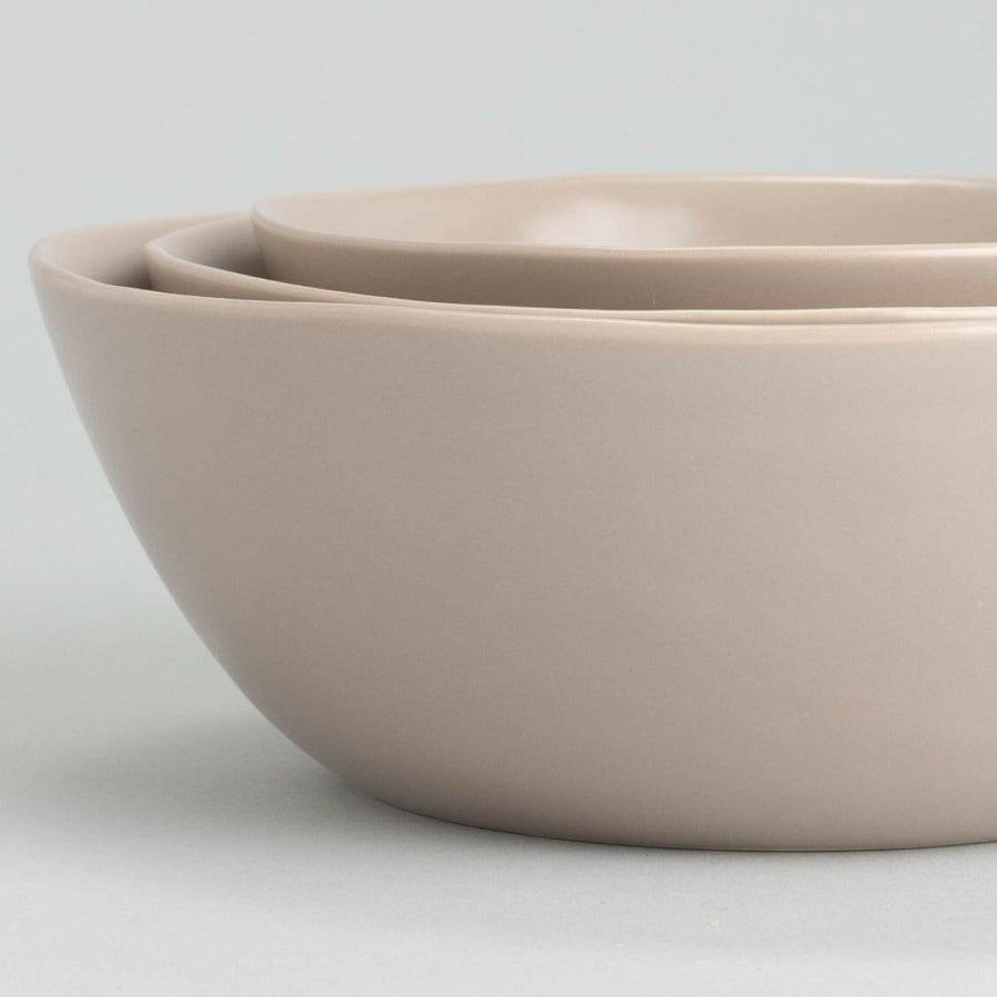 Elegant nested serving bowls designed for space-saving elegance, perfect for stylish and efficient kitchen storage
