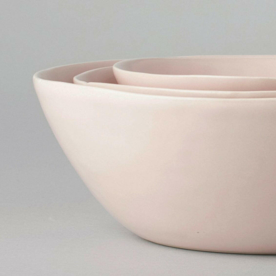 Elegant nested serving bowls designed for space-saving elegance, perfect for stylish and efficient kitchen storage