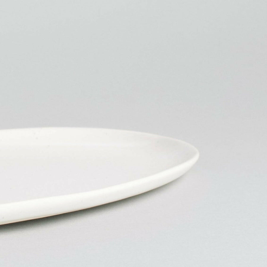 Elegant oval serving platter perfect for formal dining and stylish food presentation.