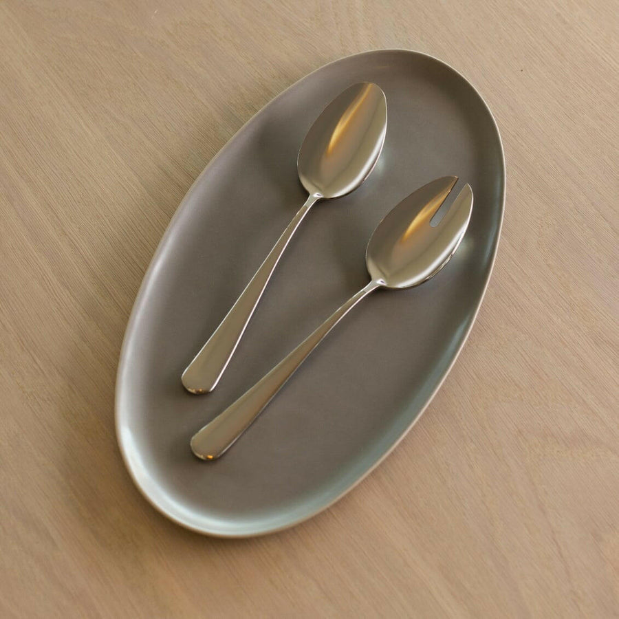 Elegant oval serving platter perfect for formal dining and stylish food presentation.