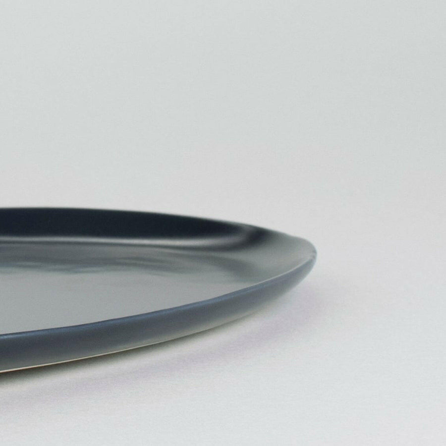 Elegant oval serving platter perfect for formal dining and stylish food presentation.