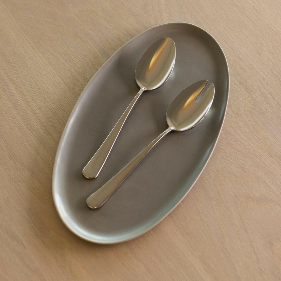 Elegant oval serving platter perfect for formal dining and stylish food presentation.