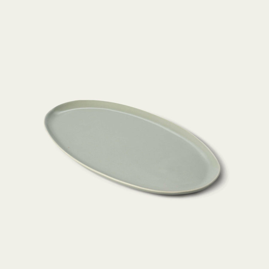 Elegant oval serving platter perfect for formal dining and stylish food presentation.