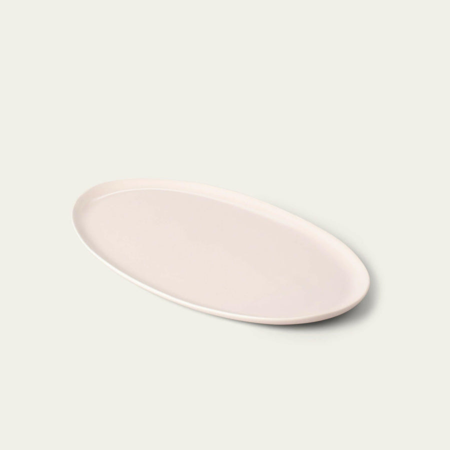 Elegant oval serving platter perfect for formal dining and stylish food presentation.