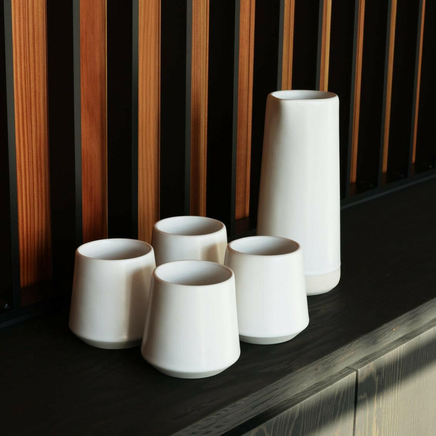 Elegant glass carafe showcasing refined craftsmanship and timeless design ideal for sophisticated dining settings.