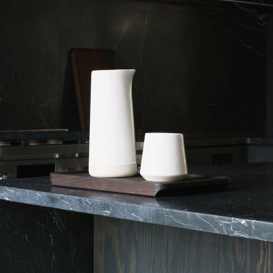 Elegant glass carafe showcasing refined craftsmanship and timeless design ideal for sophisticated dining settings.