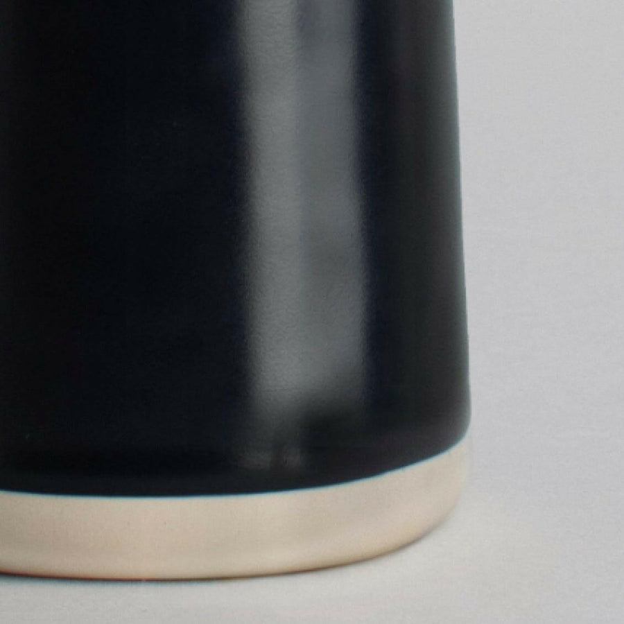 Elegant glass carafe showcasing refined craftsmanship and timeless design ideal for sophisticated dining settings.