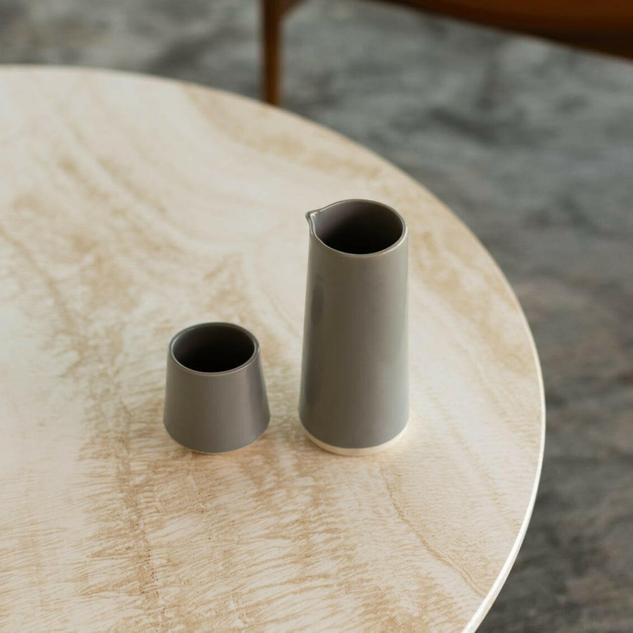 Elegant glass carafe showcasing refined craftsmanship and timeless design ideal for sophisticated dining settings.