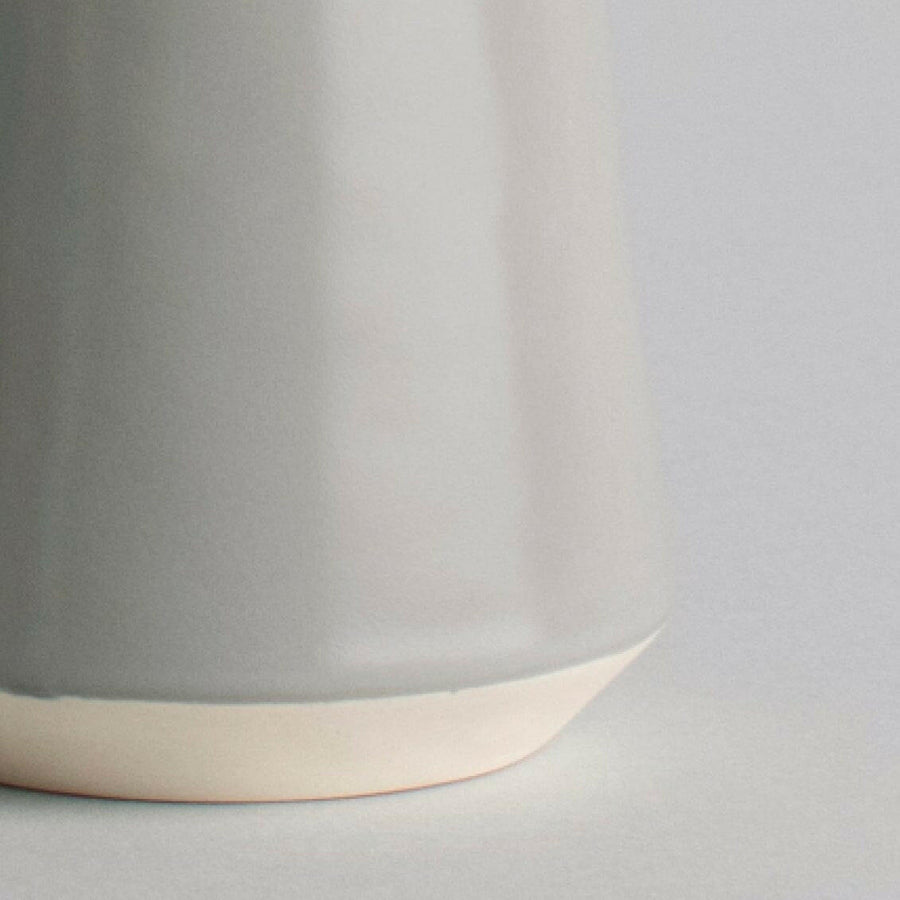 Elegant glass carafe showcasing refined craftsmanship and timeless design ideal for sophisticated dining settings.