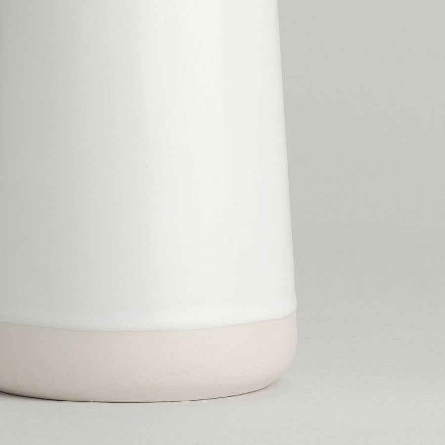 Elegant glass carafe showcasing refined craftsmanship and timeless design ideal for sophisticated dining settings.