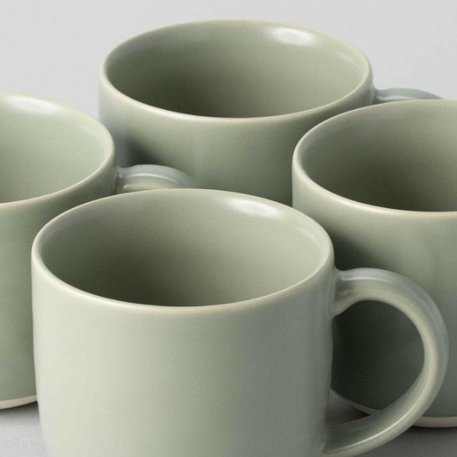 Stylish ceramic mugs perfect for elegant coffee and tea experiences, combining functionality with modern design.
