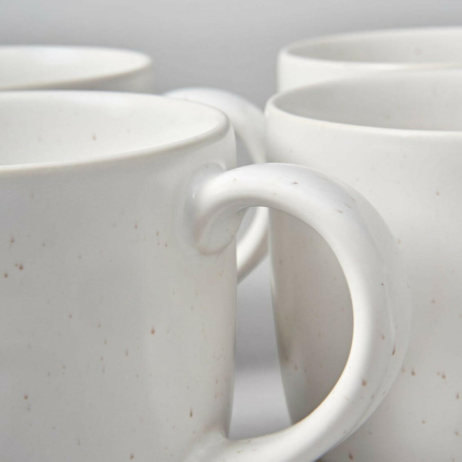 Stylish ceramic mugs perfect for elegant coffee and tea experiences, combining functionality with modern design.