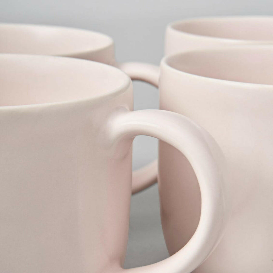 Stylish ceramic mugs perfect for elegant coffee and tea experiences, combining functionality with modern design.