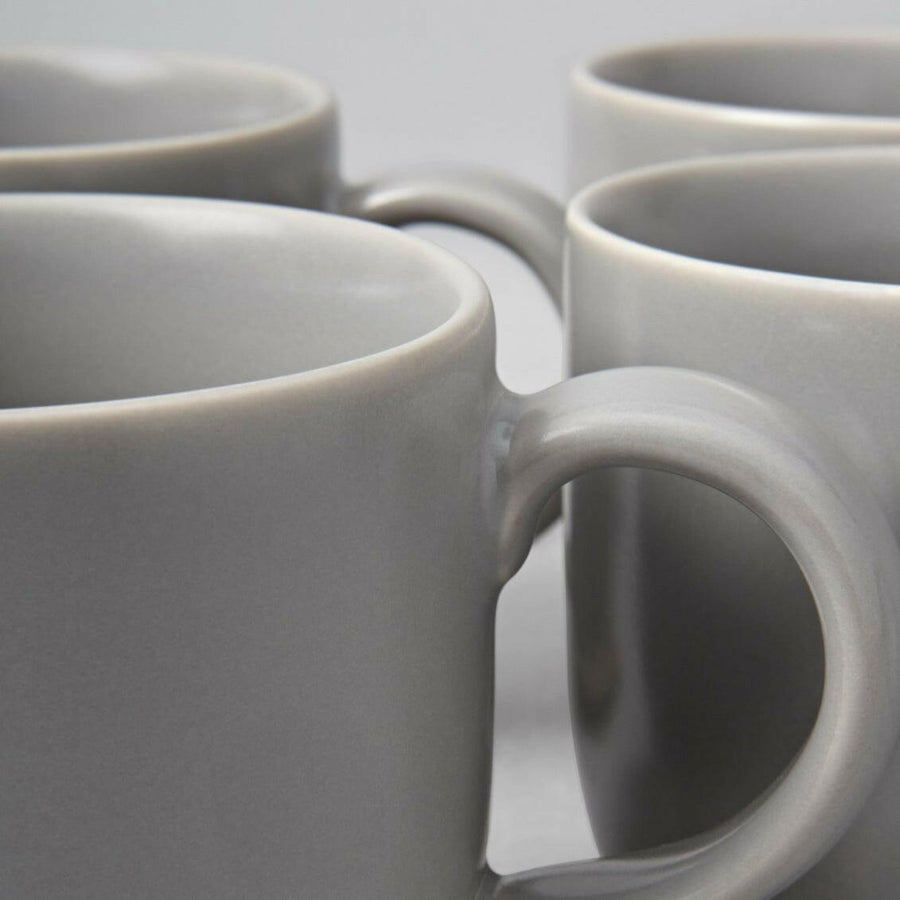 Stylish ceramic mugs perfect for elegant coffee and tea experiences, combining functionality with modern design.